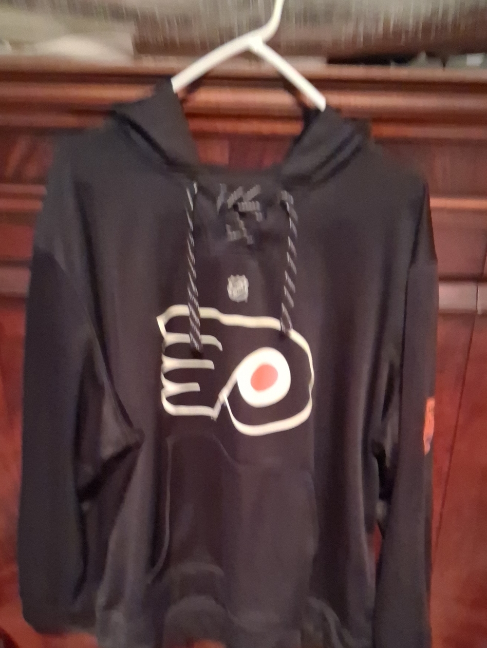 Reebok Black Philadelphia Flyers Hoodie with White and Orange Logo